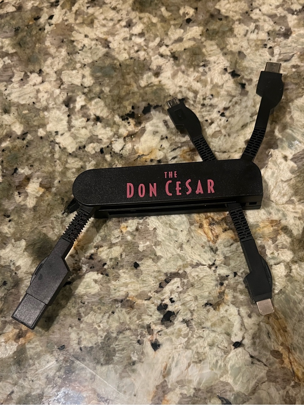 The Don Cesar 4-in-1 Charging Cable - Black with Pink Logo - Brand New!